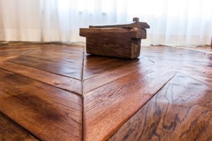 Fishbone laying of parquet of Tuscan Oak